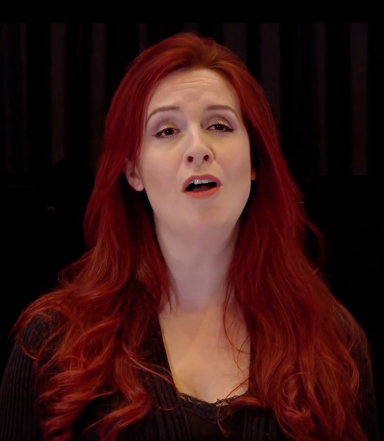 video still of Kitty Whateley singing Lori Laitman&rsquo;s initial art song film, Sarong Song, which was the winner for Cinema Carnival&rsquo;s Spring 2024 Season for Best Original Score, won for Best Animation in the Scotland International Festival of Cinema, won Best Original Song in the Global Music Awards, received Honorable Mention in the Mindfield Film Festival in Albuquerque and Athens International Monthly Art Film Festival, and the composer was nominated for Best Composer of the Season in the Montreal Independent Film Festival and Swedish International Film Festival