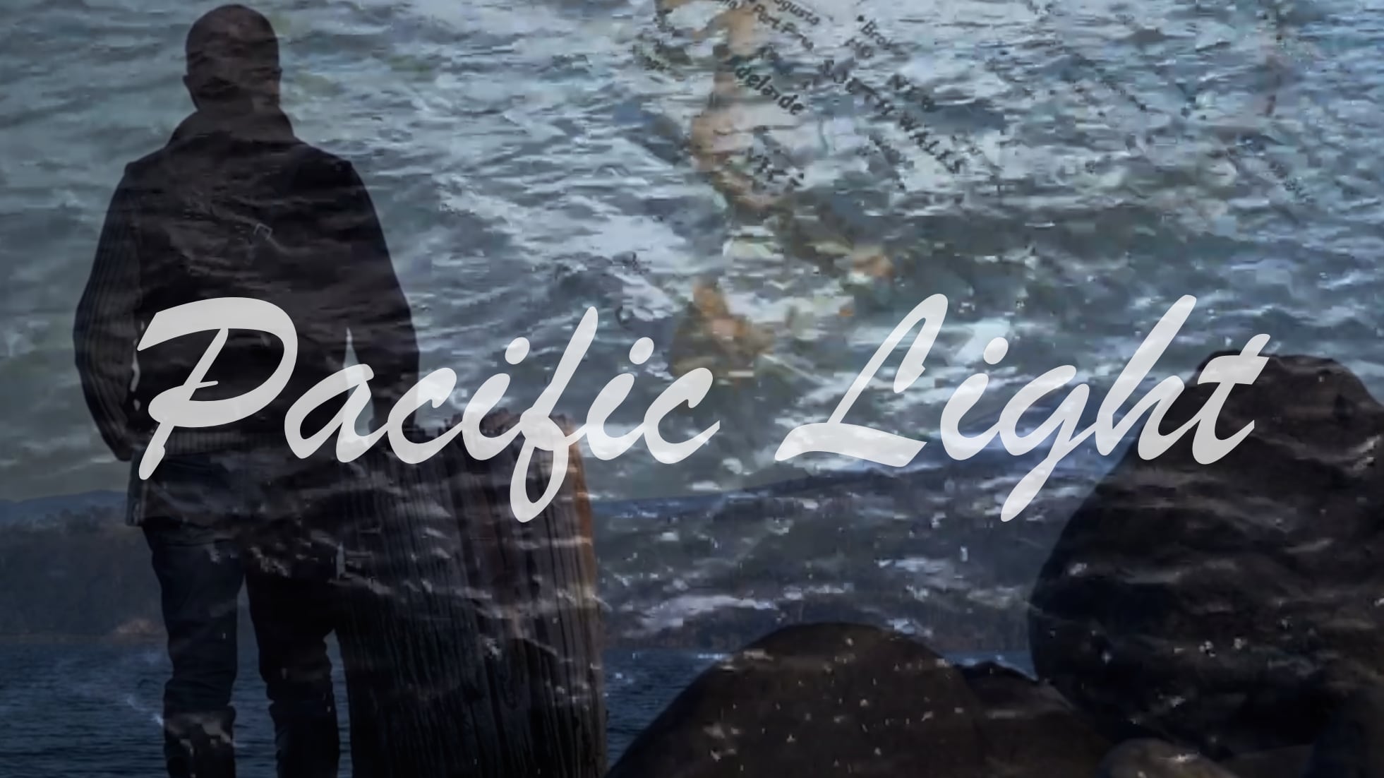 words Pacific Light in front of silhouette of man looking out on water